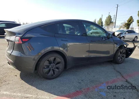 2025 Tesla Model Y from USA, damaged, VIN 7SAYGDED4SF242721